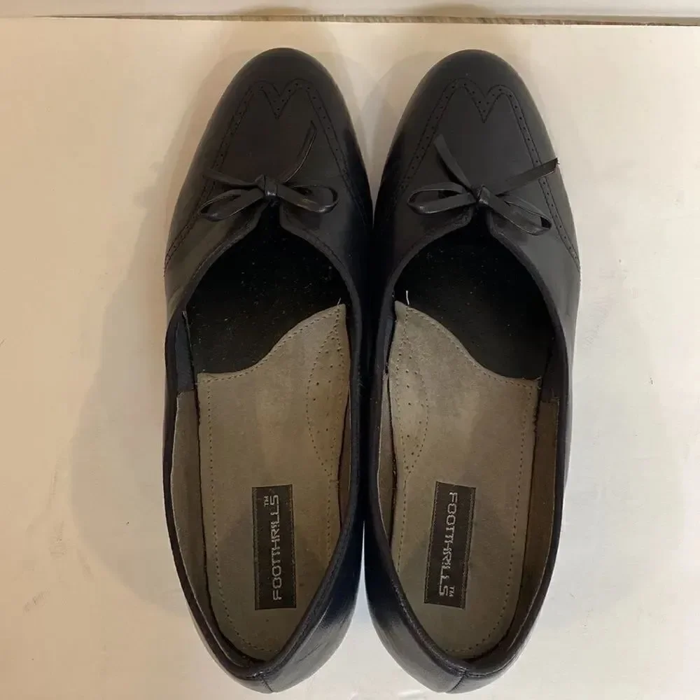 Footthrills black wingtip classic leather pumps size 7.5